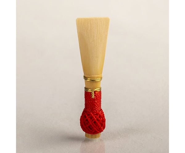 BASSOON REED IN TUBE MEDIUM