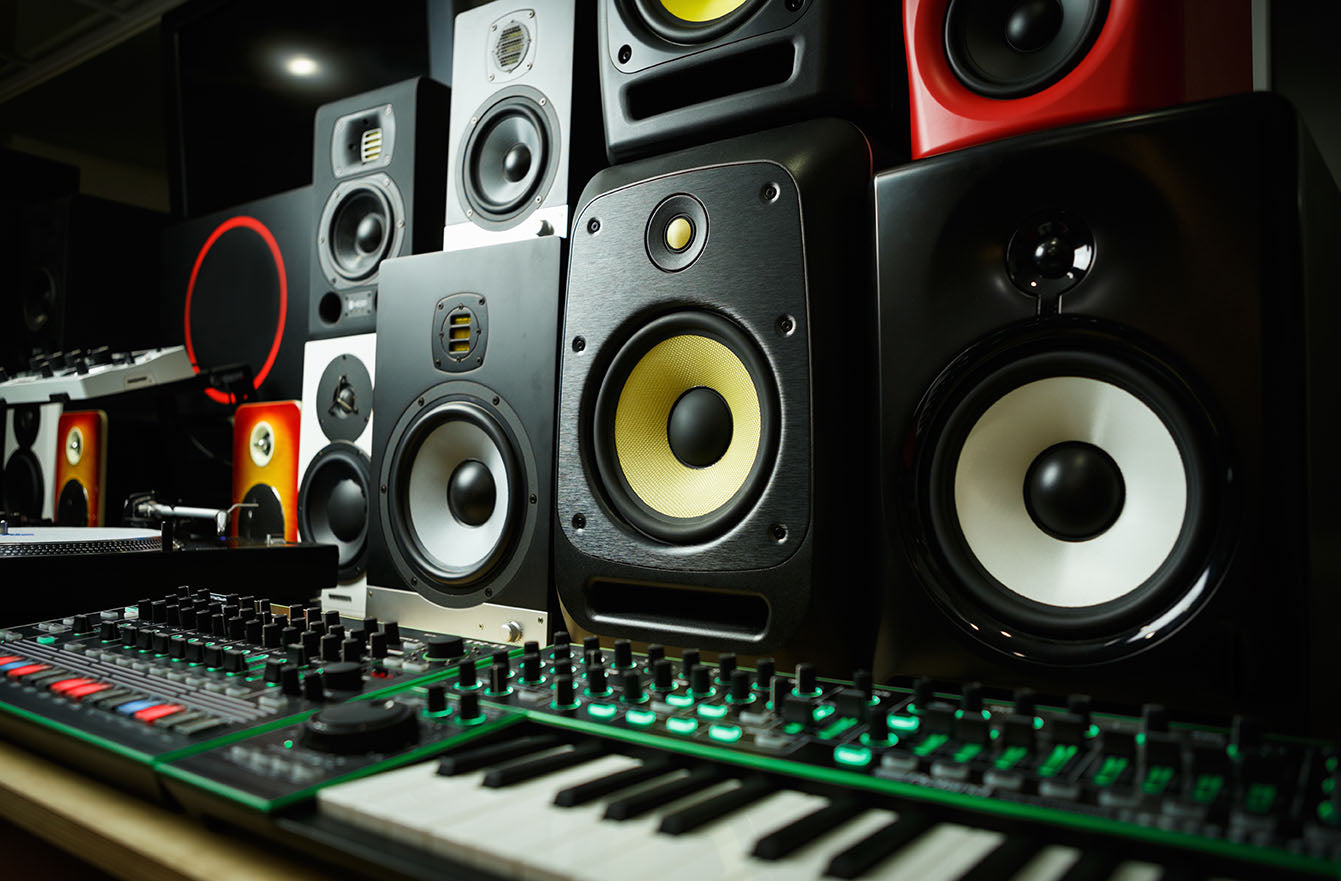 Music gear: speakers, mixers, and arranger keyboard
